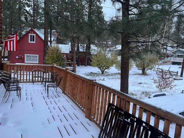 view of snow covered deck