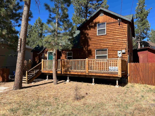 rear view of house with a deck