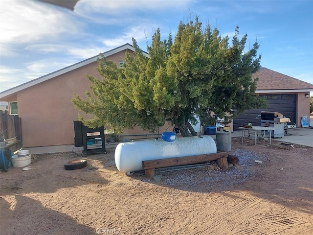 exterior space with a garage