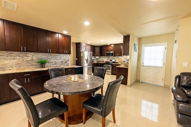 view of tiled dining area