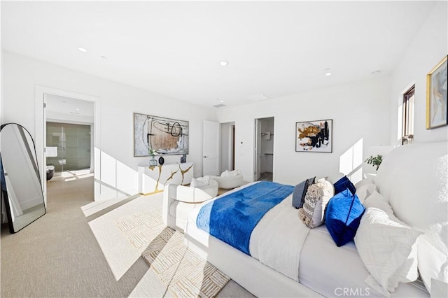 carpeted bedroom featuring a spacious closet