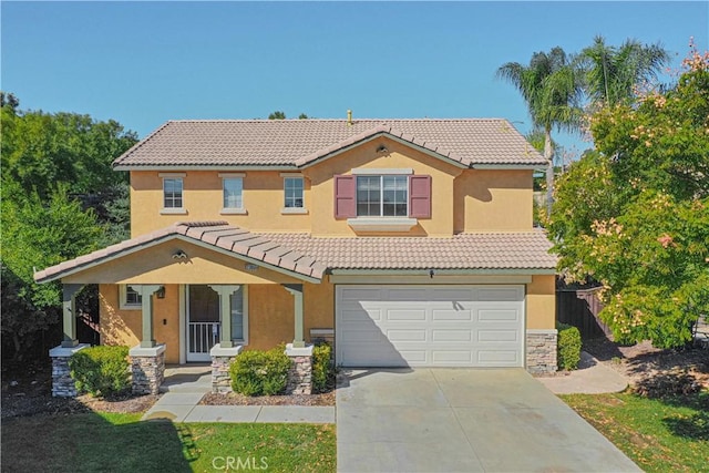 view of front of home with a garage