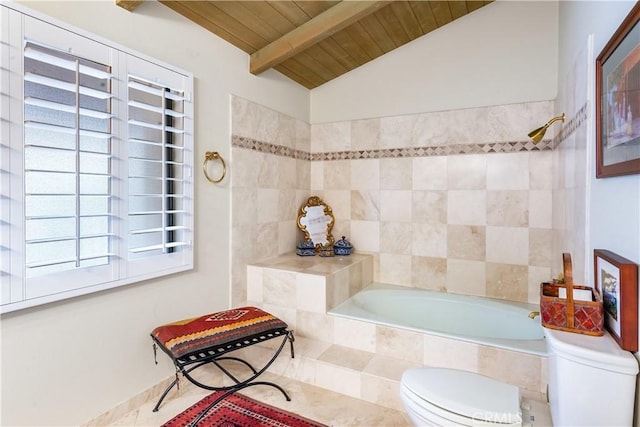 bathroom with toilet, tiled shower / bath combo, lofted ceiling with beams, and wooden ceiling