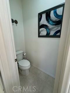 bathroom featuring toilet