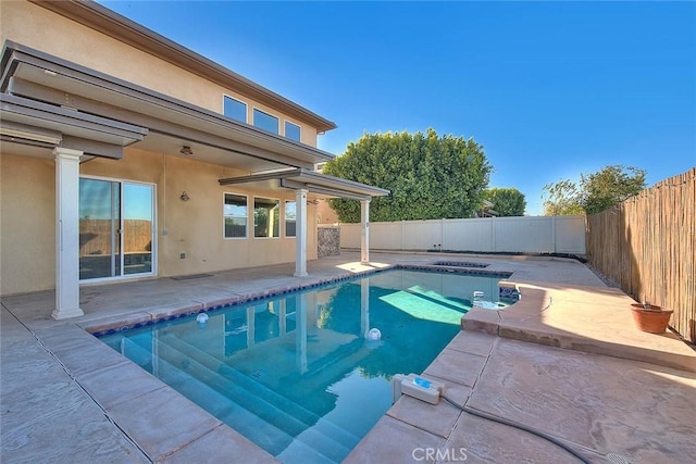 view of pool with a patio