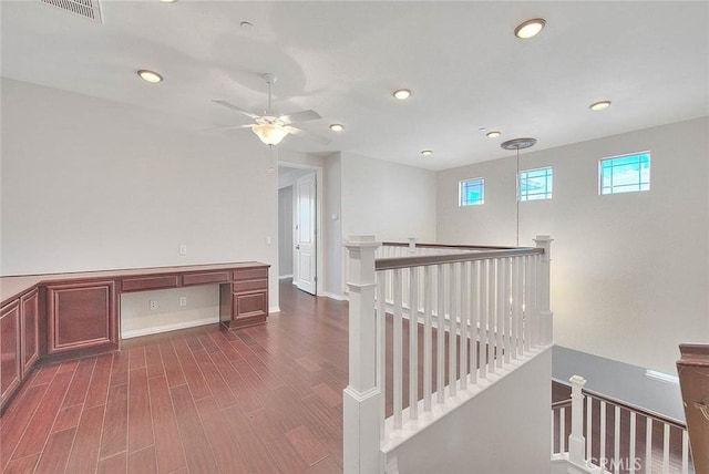 hall with dark hardwood / wood-style flooring