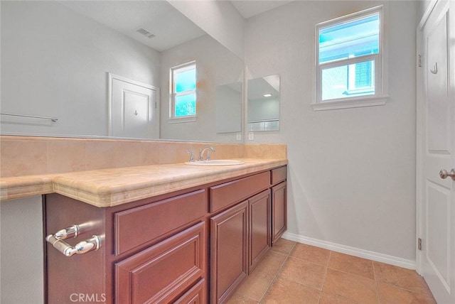 bathroom featuring vanity and tile patterned floors