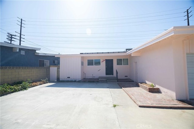 back of house with a patio area