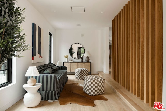 sitting room with light hardwood / wood-style floors