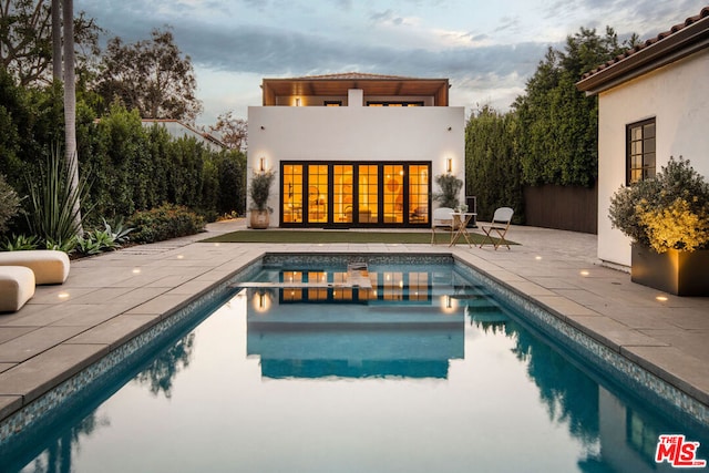 rear view of property with a patio