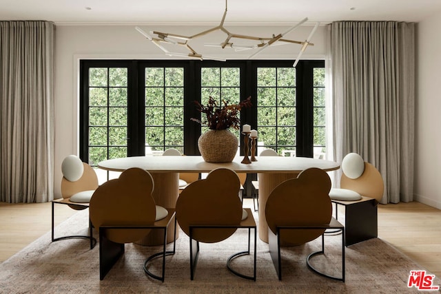 dining space featuring ceiling fan and light hardwood / wood-style floors