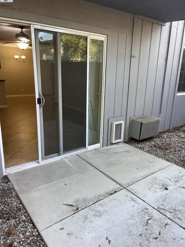 doorway to property with a patio