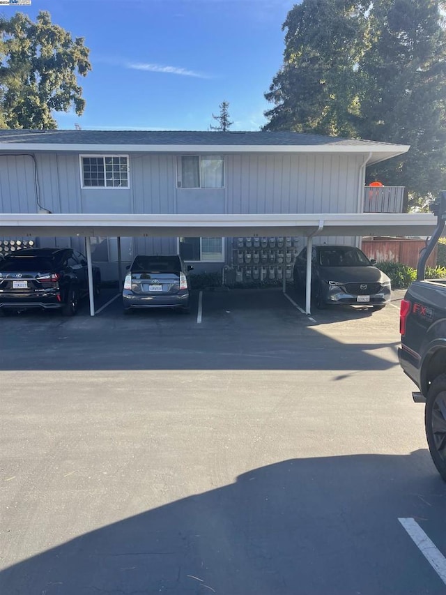 exterior space featuring a carport