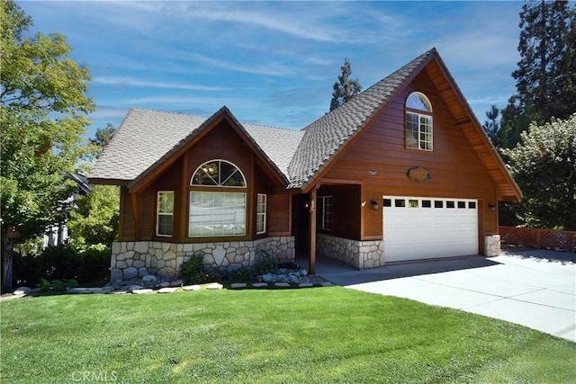 27547 W Shore Rd, Lake Arrowhead, CA 92352 - view of front of property with stone siding, concrete driveway, a front yard, and roof with shingles