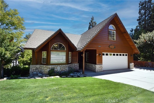 27547 W Shore Rd, Lake Arrowhead, CA 92352 - view of front of home with stone siding, driveway, a front lawn, and roof with shingles