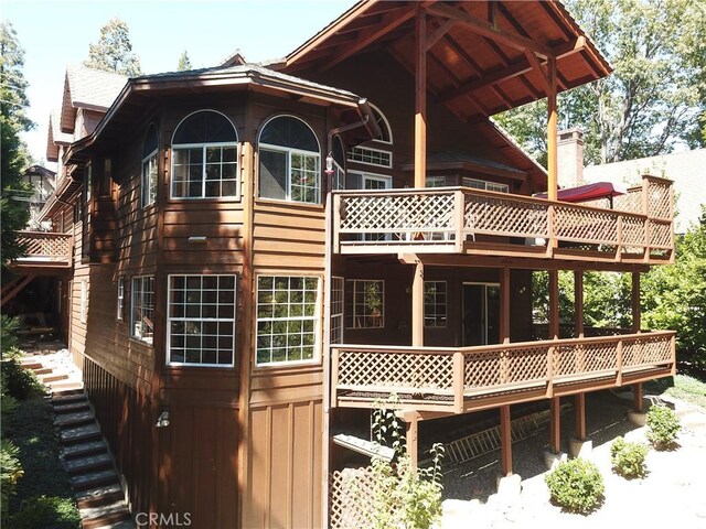 27547 W Shore Rd, Lake Arrowhead, CA 92352 - rear view of property featuring a wooden deck
