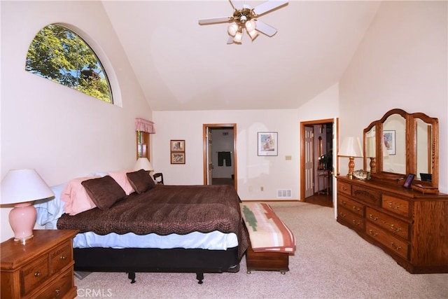 bedroom with high vaulted ceiling, carpet, a ceiling fan, and visible vents