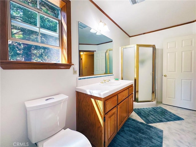 bathroom with lofted ceiling, vanity, toilet, ornamental molding, and a shower with door