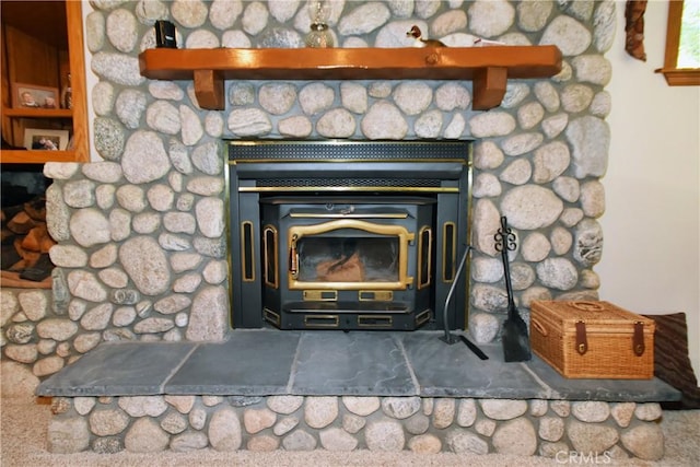 interior details featuring a wood stove