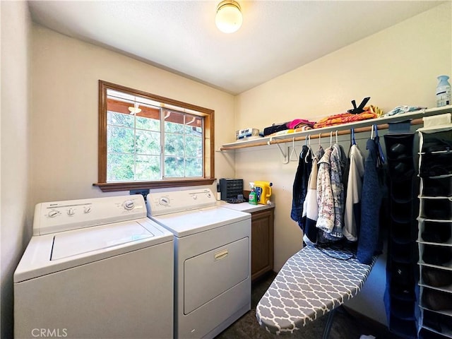 laundry room featuring separate washer and dryer