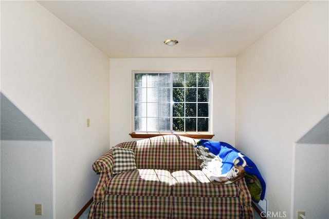 sitting room featuring baseboards