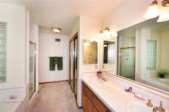 27547 W Shore Rd, Lake Arrowhead, CA 92352 - full bathroom with a stall shower, a bath, and double vanity