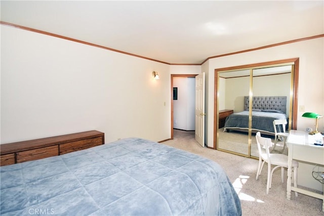 carpeted bedroom featuring a closet and crown molding