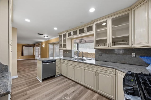 kitchen with cream cabinetry, dishwasher, and light wood-type flooring