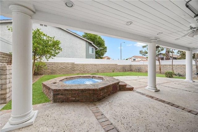 view of patio / terrace featuring ceiling fan