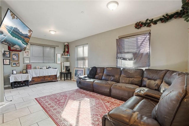 living room with light tile patterned flooring