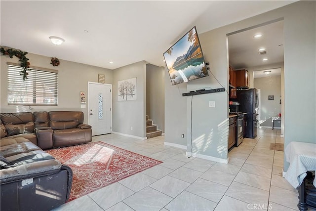 living room featuring light tile patterned floors