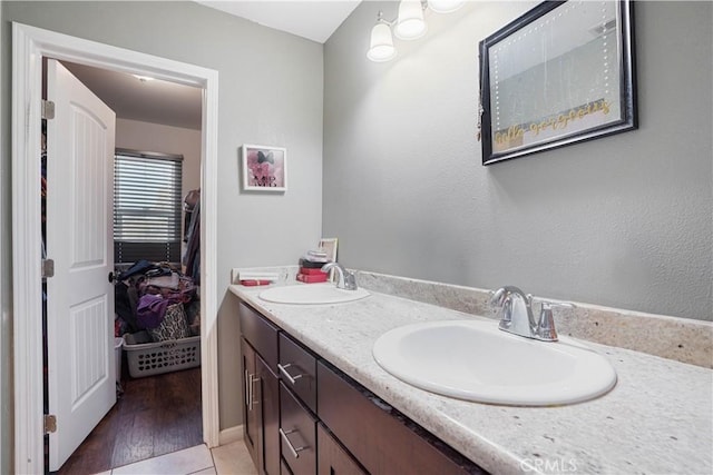 bathroom featuring vanity and tile patterned flooring