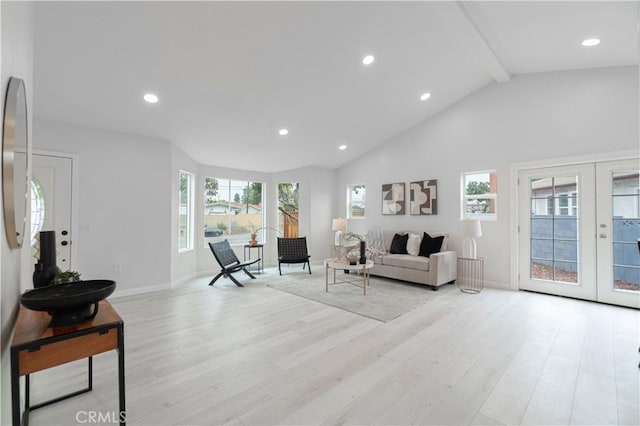 living room featuring baseboards, light wood-style flooring, french doors, high vaulted ceiling, and beam ceiling