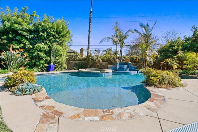 view of pool featuring an in ground hot tub