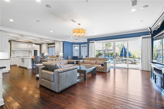 living room featuring crown molding and dark hardwood / wood-style floors