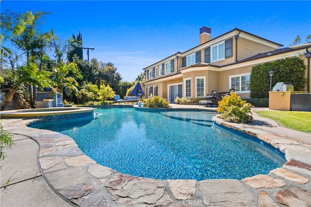 view of pool with a patio area