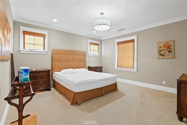 carpeted bedroom featuring crown molding and a notable chandelier