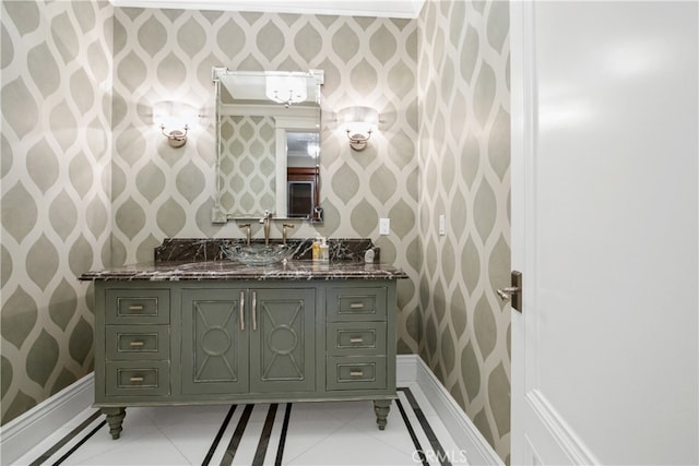 bathroom featuring vanity, ornamental molding, and tile patterned floors