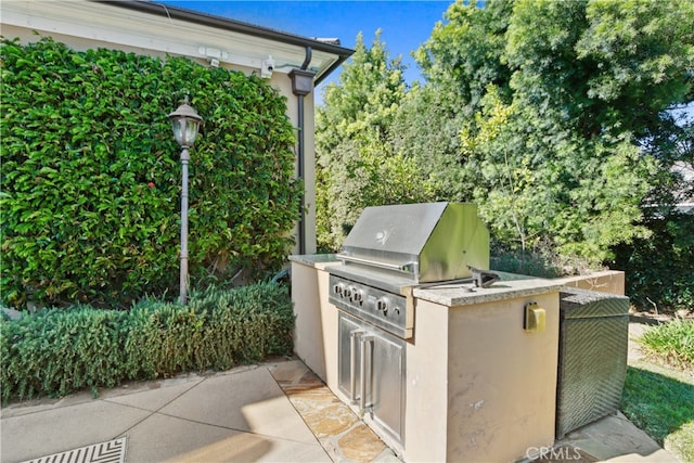 view of patio with area for grilling