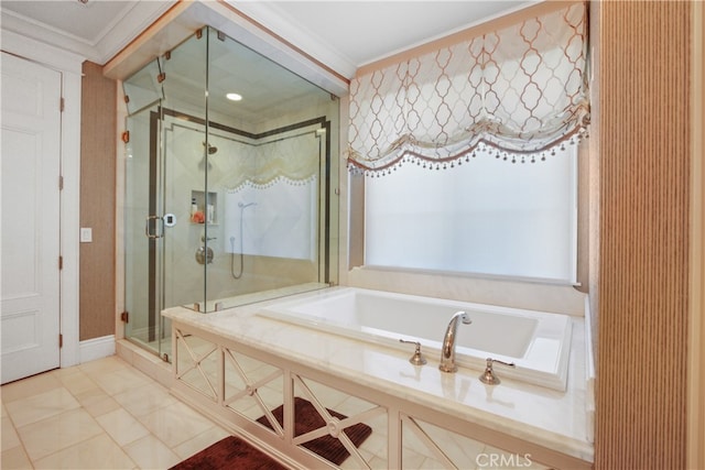 bathroom with tile patterned flooring, crown molding, and shower with separate bathtub