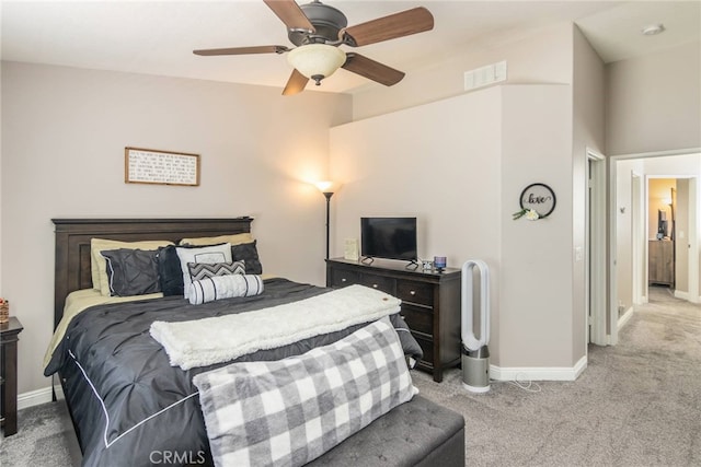 bedroom featuring baseboards, ceiling fan, carpet, and visible vents