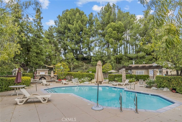 community pool featuring a patio