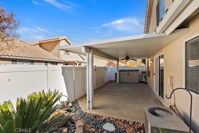 view of patio featuring ceiling fan