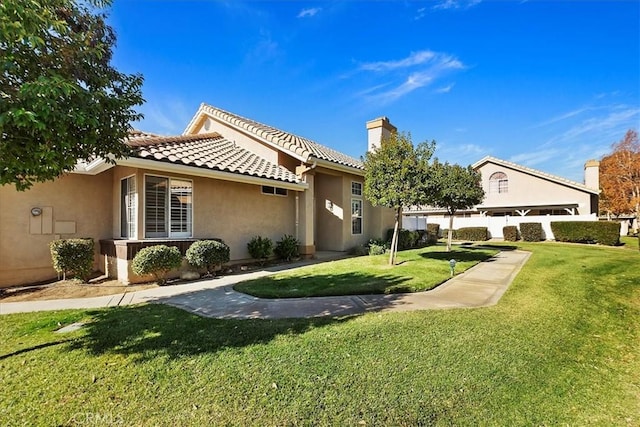 exterior space with a front yard