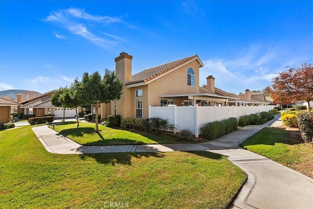 exterior space with a front yard