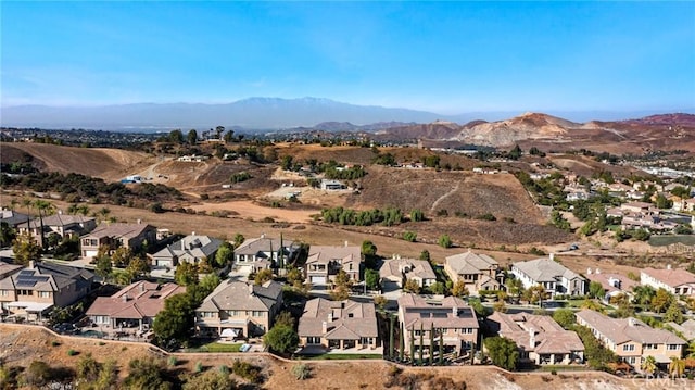 drone / aerial view featuring a mountain view