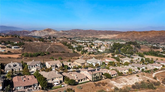 drone / aerial view featuring a mountain view