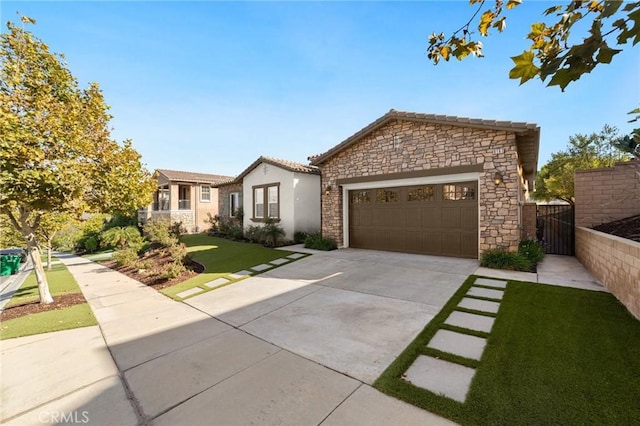 view of front of house featuring a front lawn and a garage