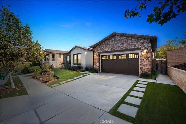 view of front of house with a front lawn and a garage