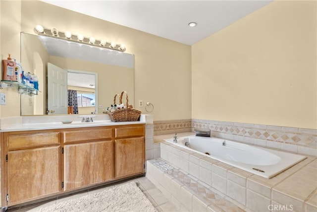 6277 Linda Lee Dr, Yucca Valley, CA 92284 - bathroom with a jetted tub, vanity, and tile patterned floors